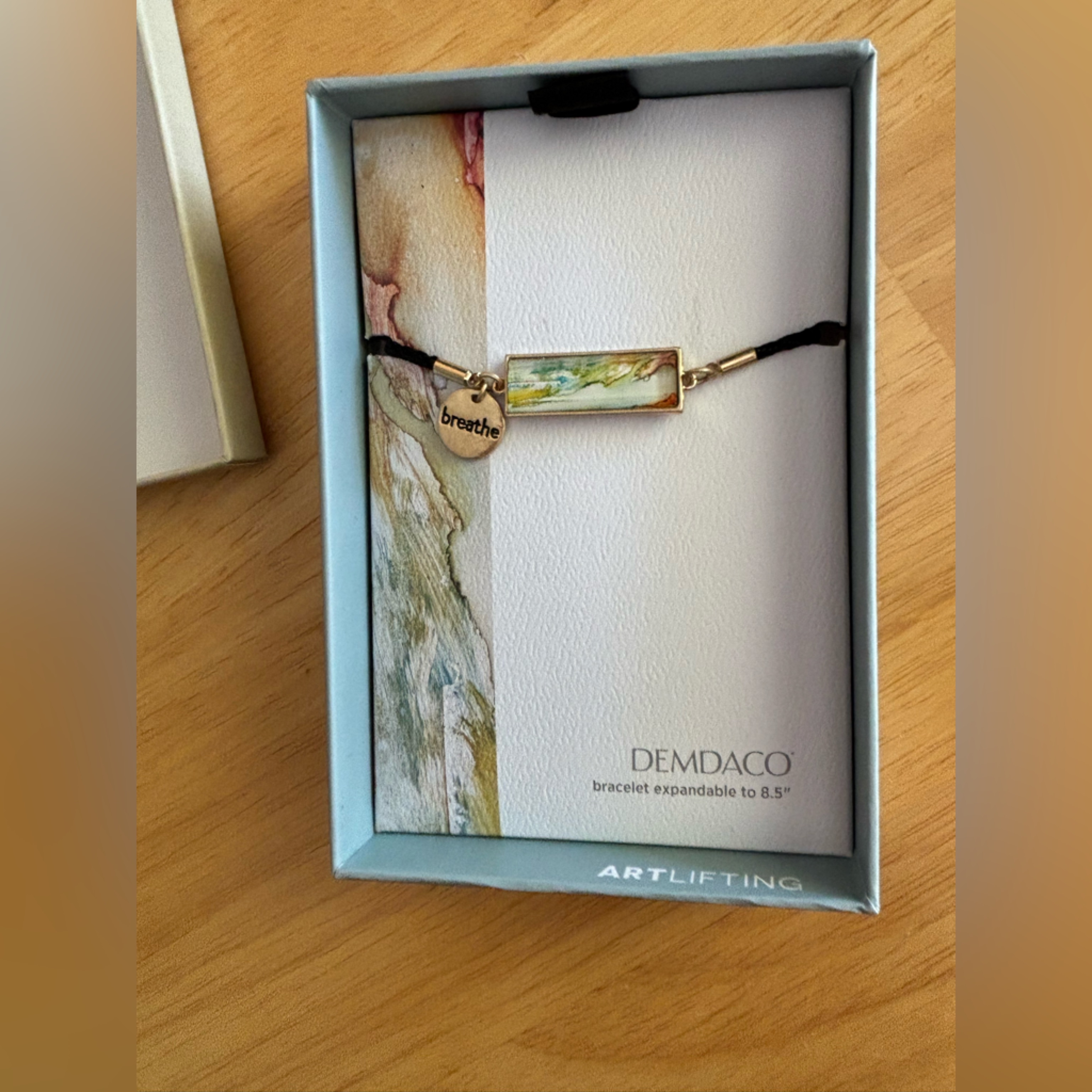 Demdaco Artful Bracelet With Gold And Black Cord